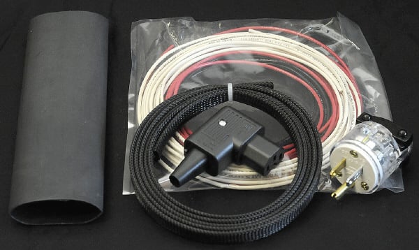 A photo of the parts included in the Power Cord kit.