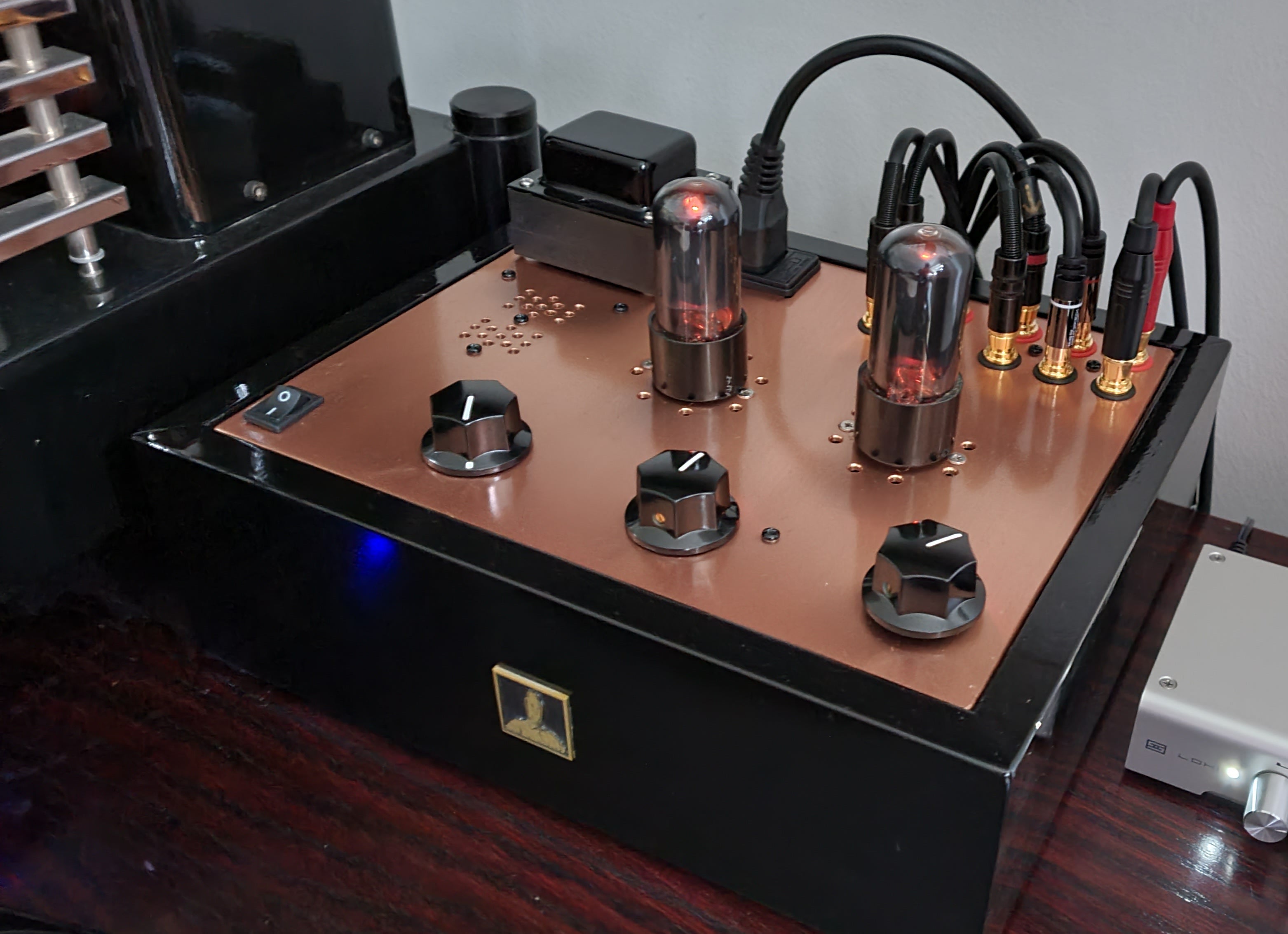 Bottlehead Moreplay preamplifier with a black base and copper paint.