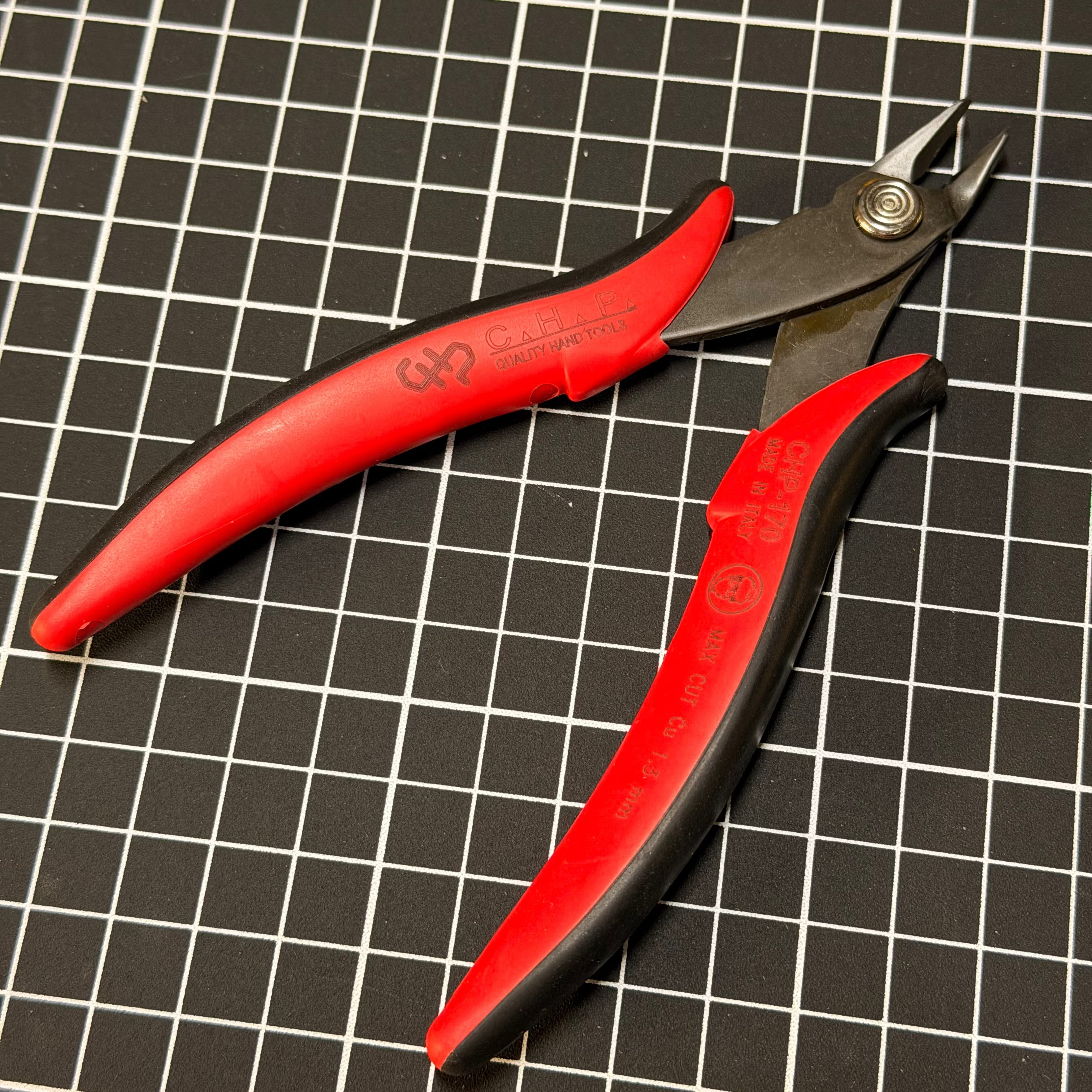 Flush cut wire snippers on a cutting mat