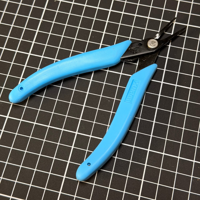 Tweezer Nose Pliers on a cutting mat